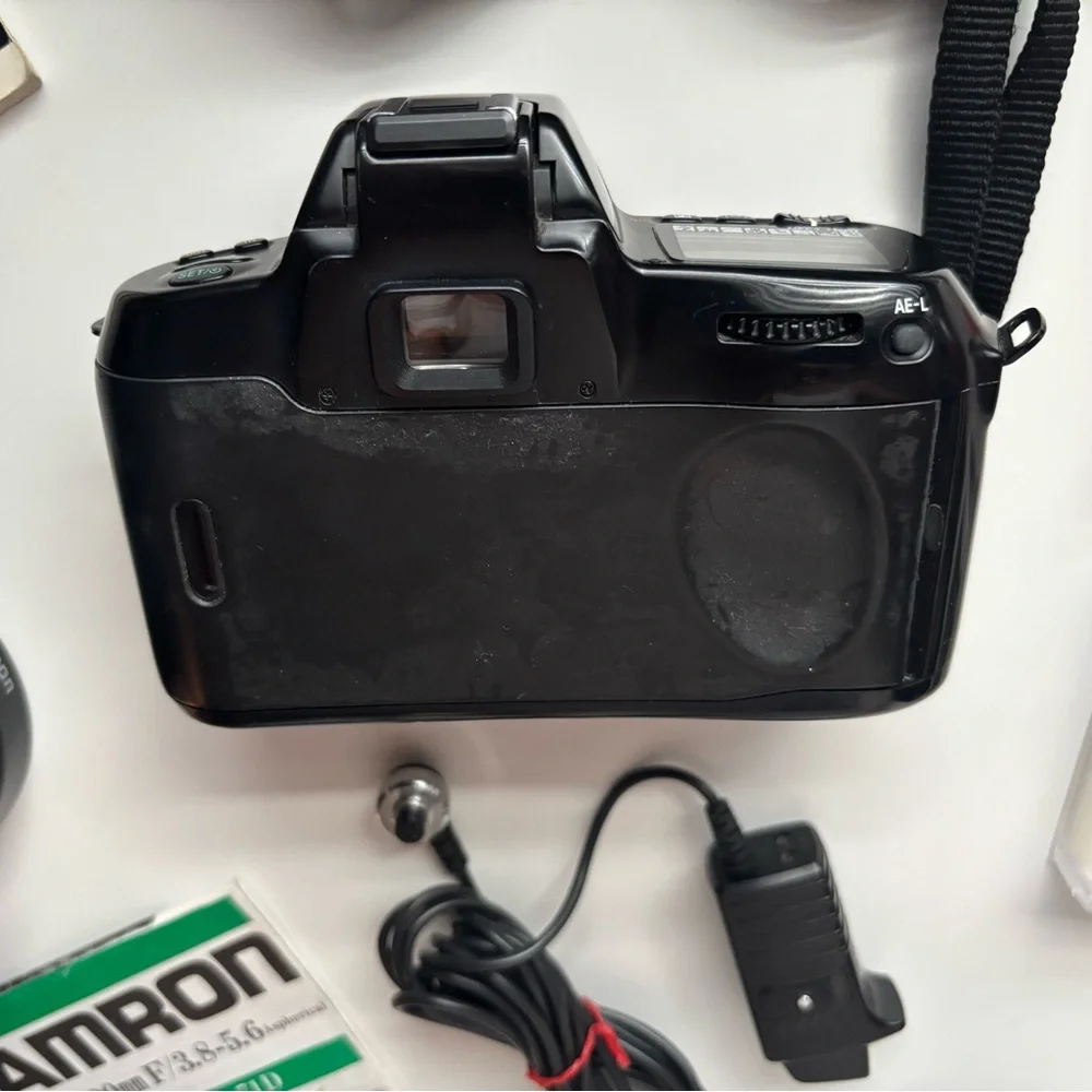 Nikon N70 SLR Camera Body with Branded Strap and Accessories